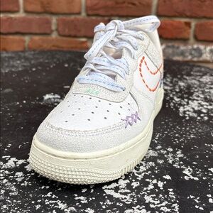 NikeWomen’s Air Force 1 '07 SE '101' White and Gold Sneaker size 7.5